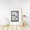Fragrant Gathering by Line & Blossom Design simply framed surrounded by decorative items.