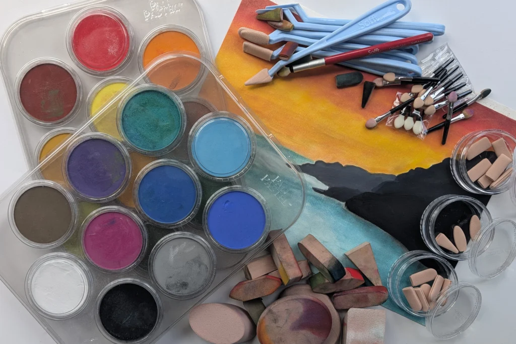 An array of PanPastels and tools