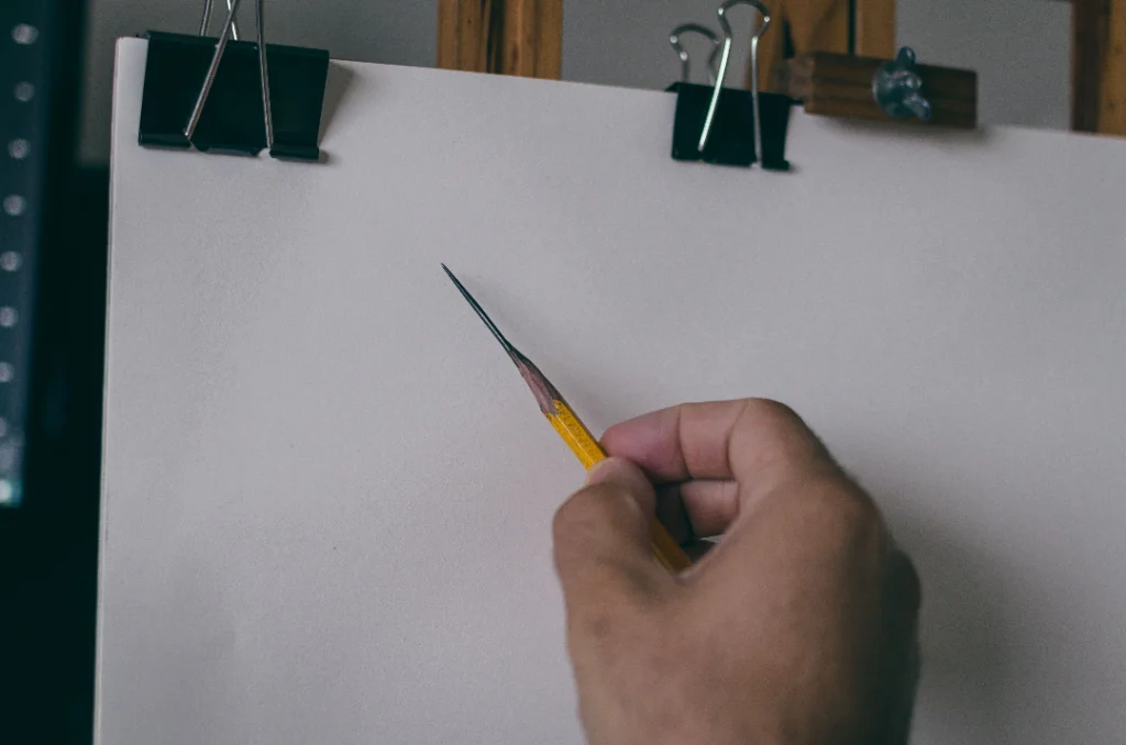 graphite pencil with extra long lead exposed
